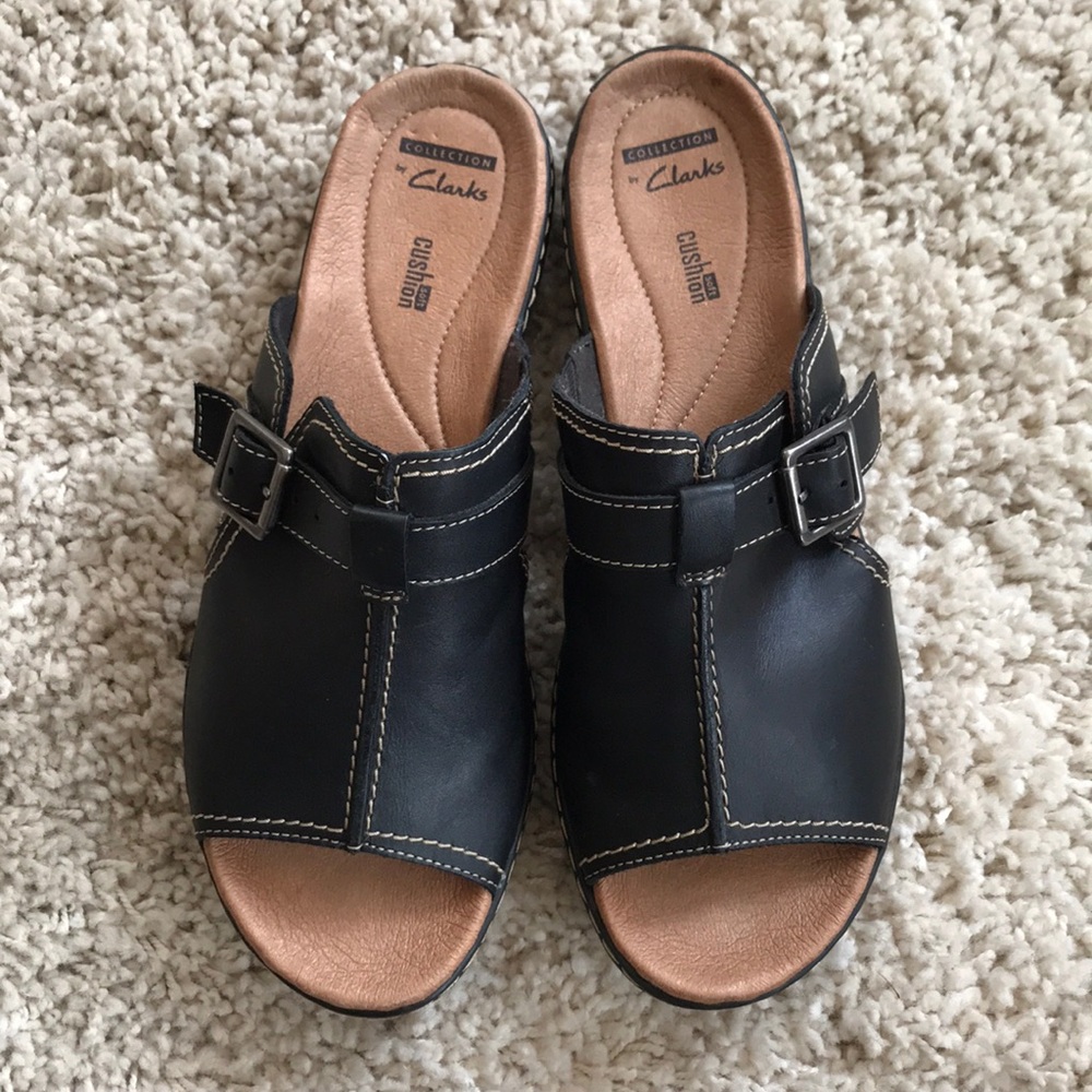 Collection by Clark’s black leather buckle slides